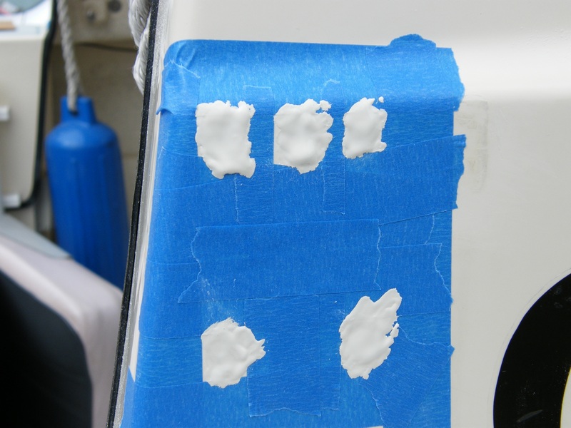 Starboard gelcoat was applied but did not fully fill the depressions. Cleaned with acetone and applied a second coat. After sanding level a few air bubbles showed so a third very light "wash" coat filled the bubbles and it ended up a perfect color match.