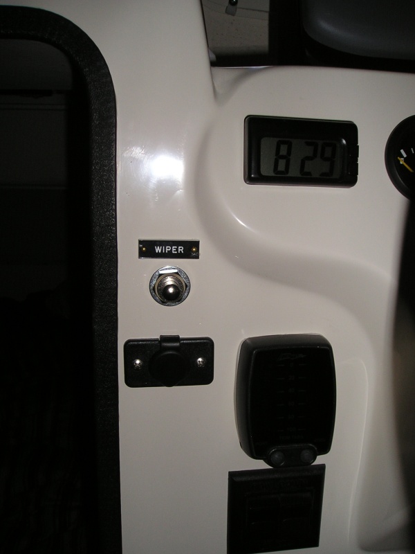 Starboard momentary sw. for wiper. Bennett trim tab sw. and indicators.