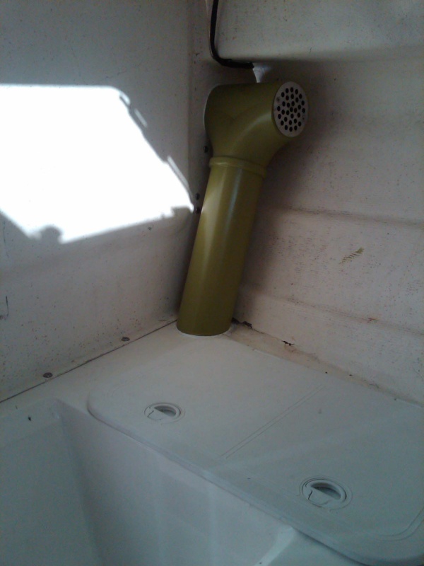 starboard side V-berth exposed ductwork with another strainer
