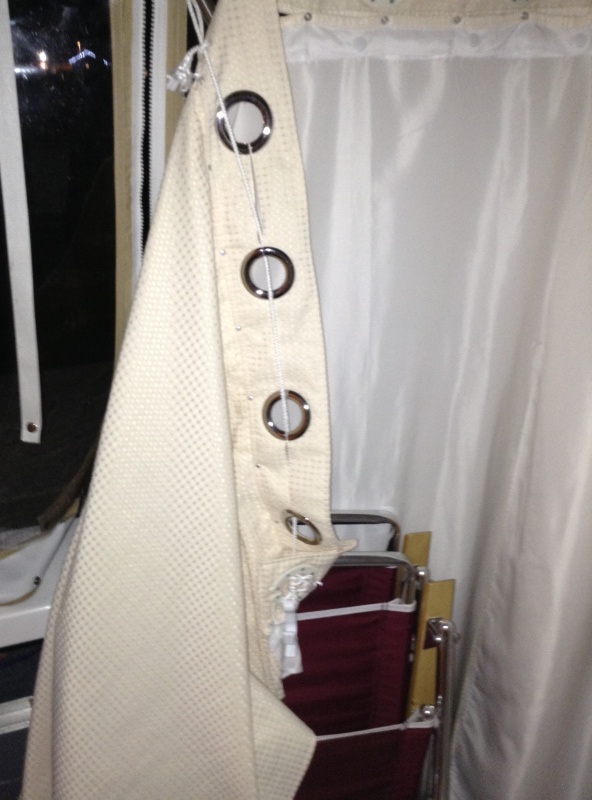 Starboard view: detaching the clip from the handle is swift allowing for easy access without disturbing the set-up.  This has made our lives so much easier.