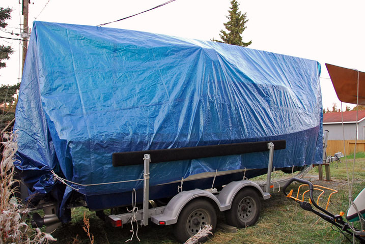 Starboard view of blue tarp.  Cost: < $100, used 4 years and counting.  Good deal for me!  And it works good too!