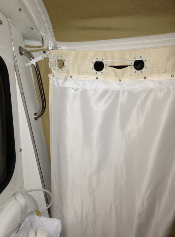 Starboard view: rope, clip and curtain in place.