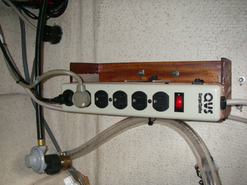 Step 2, wired power strip to the backside of inlet plug(upper left). Now I have a 15 amp resettable breaker, and an on/off indicator switch/light. My dock outlet is already GFCI.