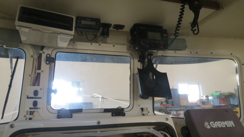 Stereo, Sirius Radio, twin 12 V outlets and iPad mount added to helm.