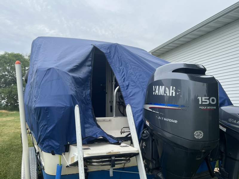 Stern view, zipper door open, new custom cover