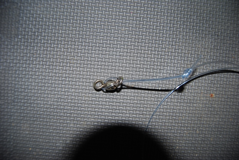 stick loop through and around hardware, makes it quick to swap out rigs & hooks