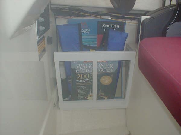 Storage rack under helm