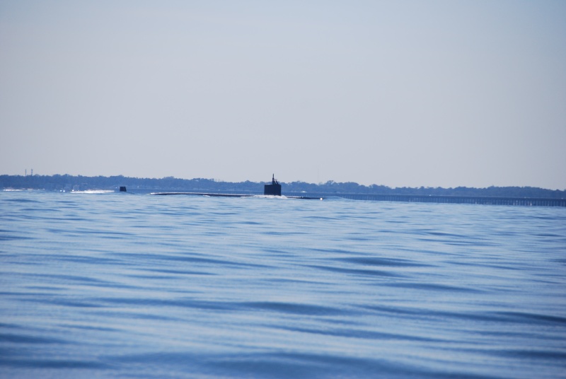 Submarine returning from sea approaching the Thimble Shoal Channel via the North and South Islands .