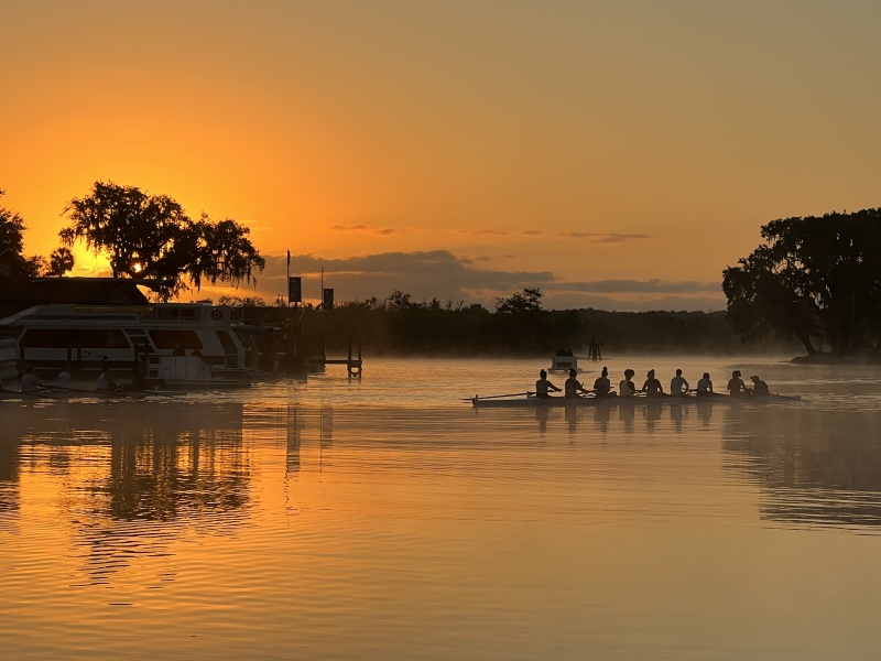Sunrise over rowers at Hontoon
