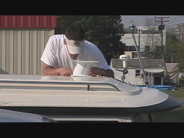 (Swee Pea) Positioning the radar mount on the roof. I was worried about the proximity to the gps.  Installer said not to worry.