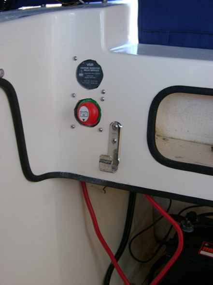 Switch and voltage sensative relay in the holes.  Doesn't quite work