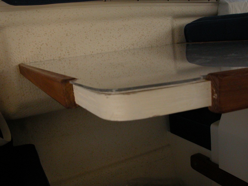 Table top aft edge cover layover