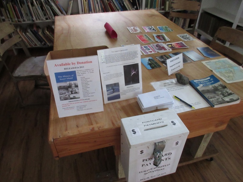 Table where you can buy postcards to support the PTA!