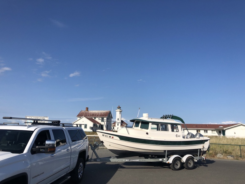 Taking her home (in front of Point Wilson Light)