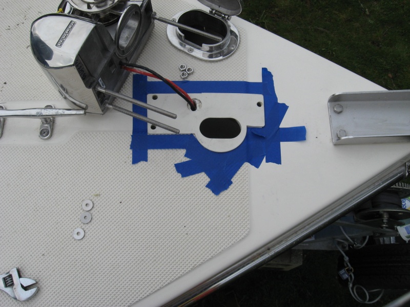 taped around gasket (did not use it)  to limit sealant spread to deck  used 3M 4200 white