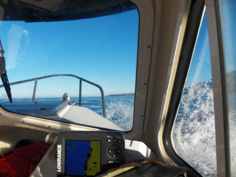 The "afternoon" winds came up at 10:15 and the swells stacked at Bajo Point.  I turned and surfed back to Yuquot.