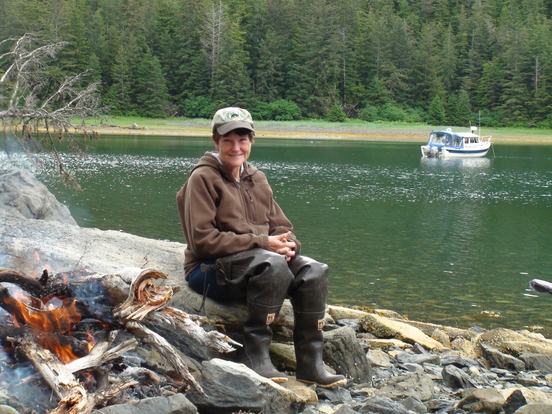 The Alaska looking girl by the fire in front of our Falcon Arm anchorage where the storm caught us