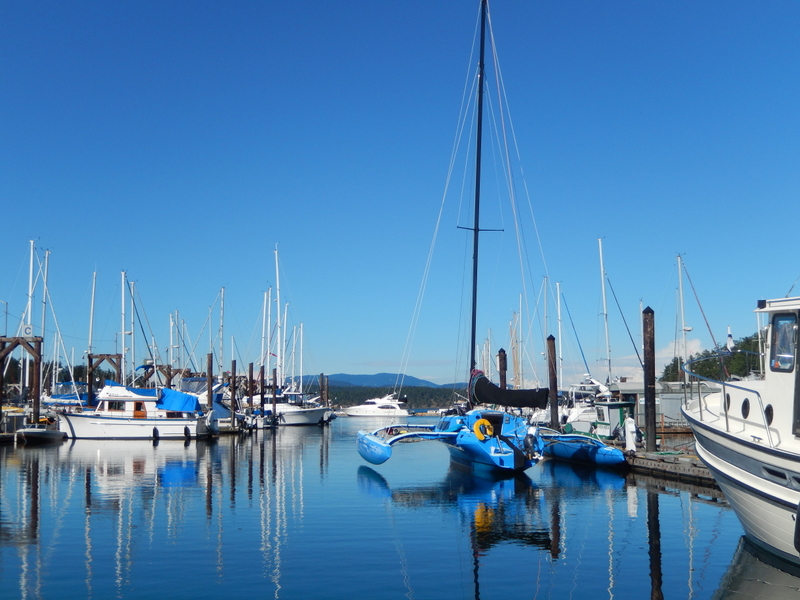 The boat docks at Friday Harbor Marina, with a gorgeous blue trimaran