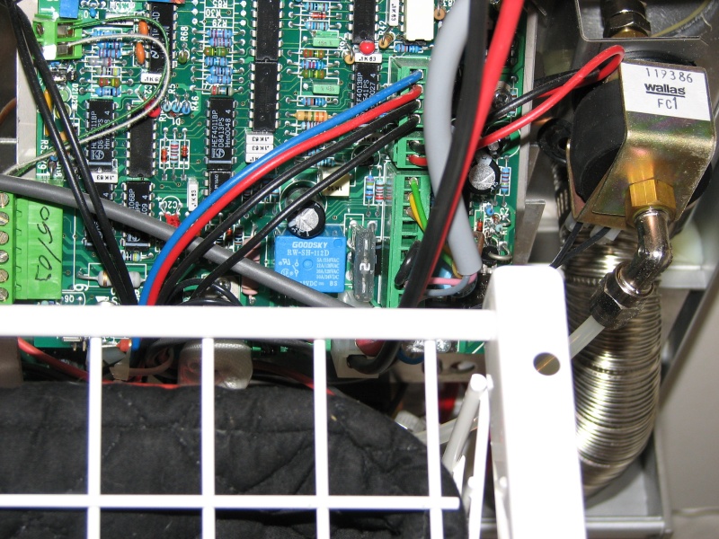 The circuit board with the fuse is facing out towards the open door. Almost like they planned on changing the fuse at some point.