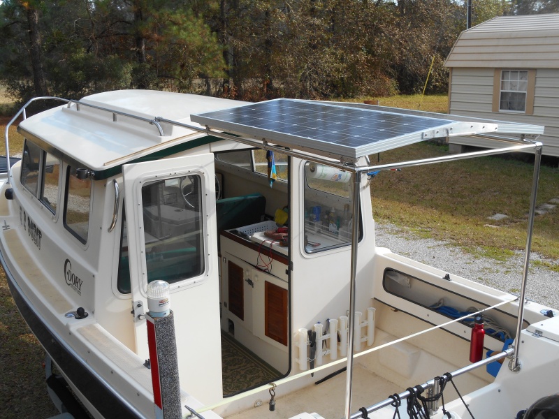 The cockpit framework is made of 7/8" thickwall SS and can be broken down to 4' sections and stored under the gunnels.