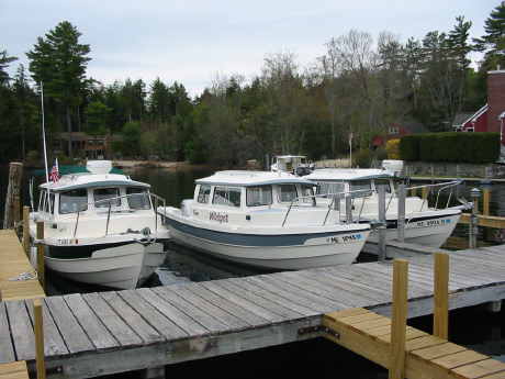 The "dories" awaiting the start of a Winnipesaukee cruise at the Y Landing Marina.