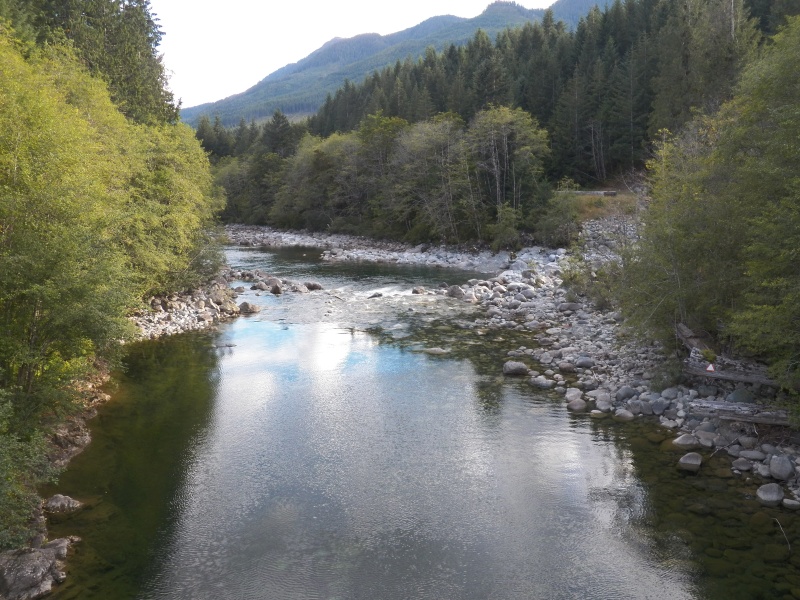 The Gold River, another that I kayaked years ago.  In the spring, it roars along from snow melt.  Now, it looks like a good river for an inner tube.  Just kidding.  On river right is a triangle sign warning boaters that danger lies ahead.