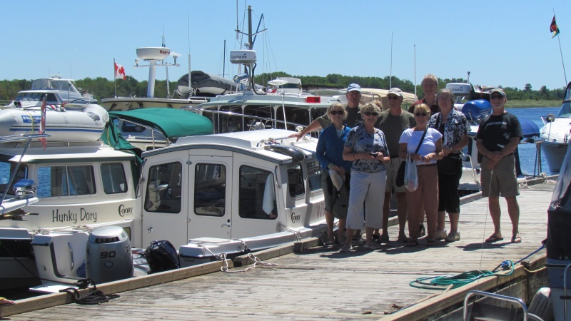 The group on the Gagetown dock. If you ever go there get the Stanley pudding at the Creek View Caf?. From the left Becky Smith, Dave Deem, Valarie Seaton, Mike Rizzo, Ginny Deem, Rick and Carol Stambaugh and Dave Seaton. Dun Smith taking the shot is not shown.
