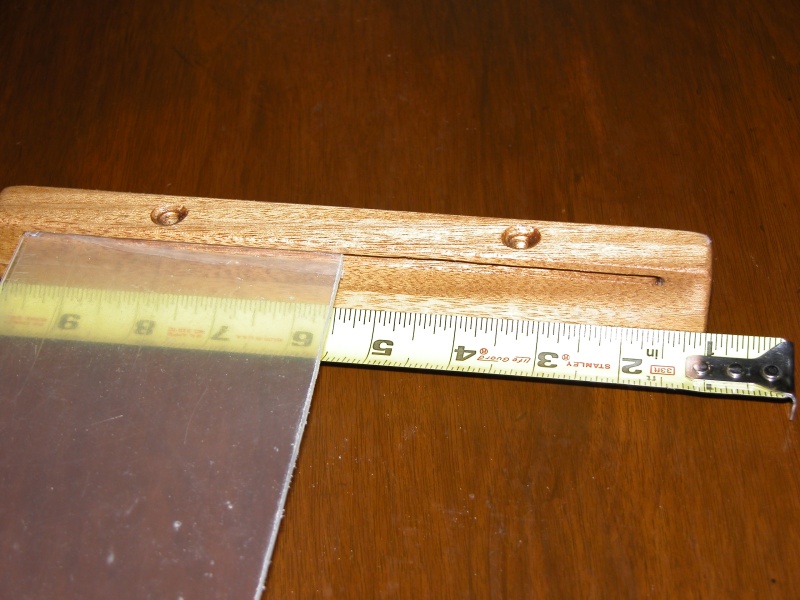The guides for the plexiglass stop abt 1/2" from each end of the 9" guides. The above pix is the bottom support guide.