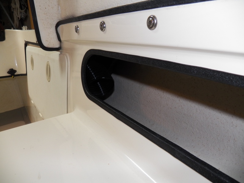 The heater control isn't a thermostat.  The thermostat is actually in the return airflow to the furnace.  Inside of the new pocket shelf is the "cold air return" that will determine the heat setting.  The little controller is supposed to allow settings between about 45 degrees and 90 degrees, but you don't get to see actual temperature numbers.