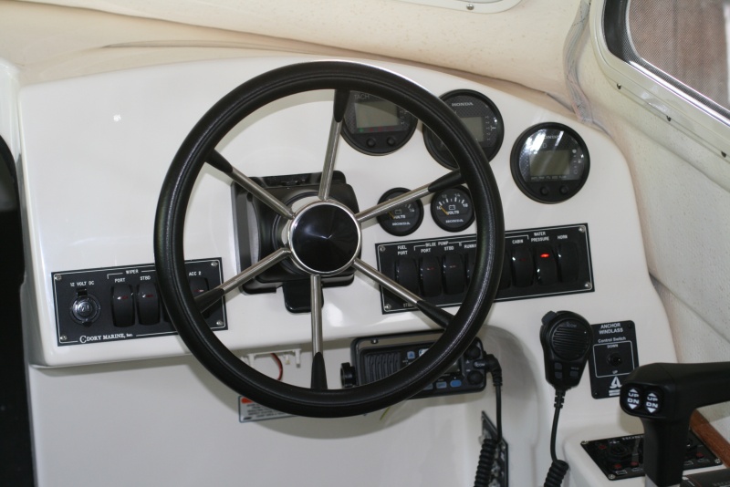 The helm (so far!) - Honda digital gauge upgrade (speed, fuel level, battery voltage, trip meter, fuel flow gph); icom M304 VHF. More to come!