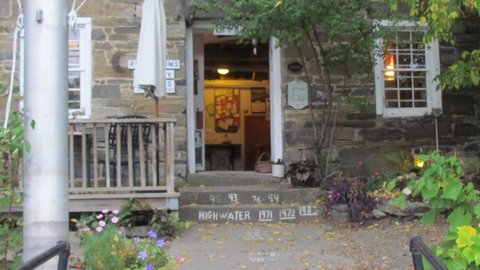 The marina office is in a three story stone farmhouse. The office on the first floor showers and bathroom on the second floor. Owner lives on the third floor. Notice years showing high water marks on the steps. They sell good coffee for 25 cents a cup. The marina is our favorite of all time.