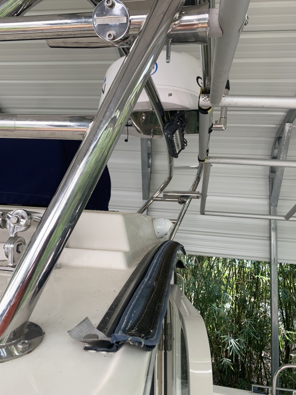 the plan is to have a plastic window on the leading edge secured to the cabin top track zipper
frame attached via Rod Holders with removable pins