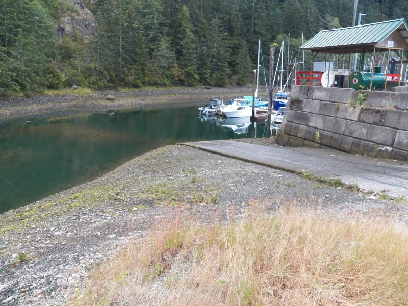 The public ramp, like many, it isn't made for low tide use.  It dropped off about a foot right at the edge.  On the other hand, I didn't see any launch fee.
