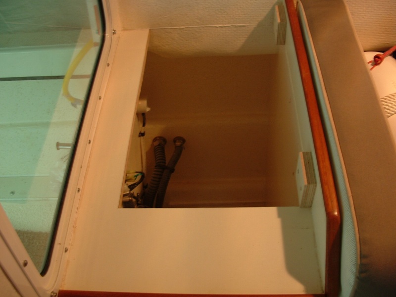The second modification involved raising a portion of the locker to accomodate a microwave (so the microwave door could open).