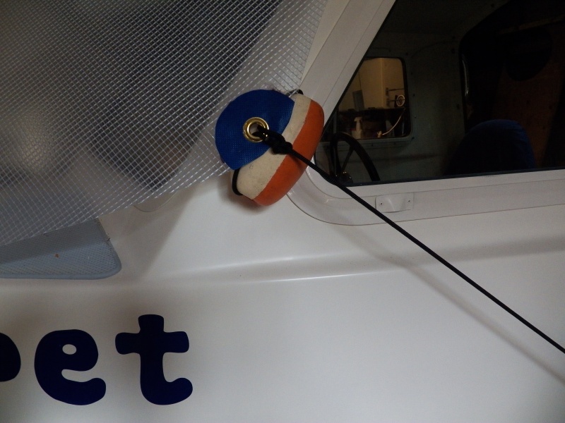 The sides are fastened to the deck cleat with net float "stand-offs."