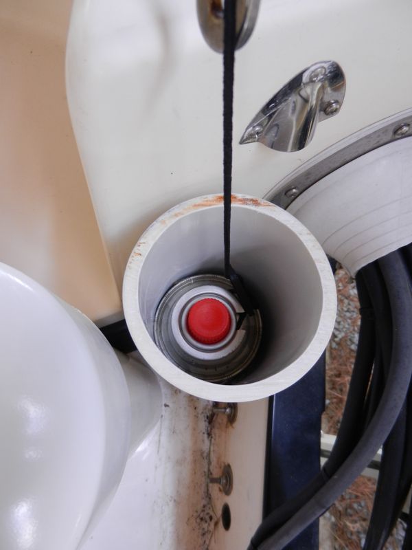 The smaller one fits two butane canisters for the galley stove