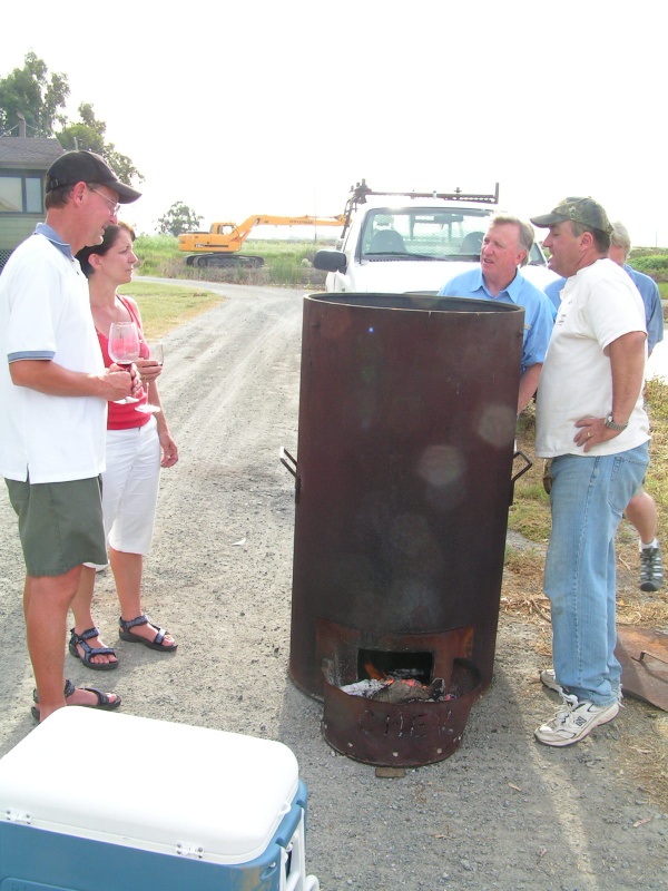 "The Smoker/Cooker"
Sam & Kerry (Salty C's), Jim (Pounder) and John (Dinner Belle II) looking on.