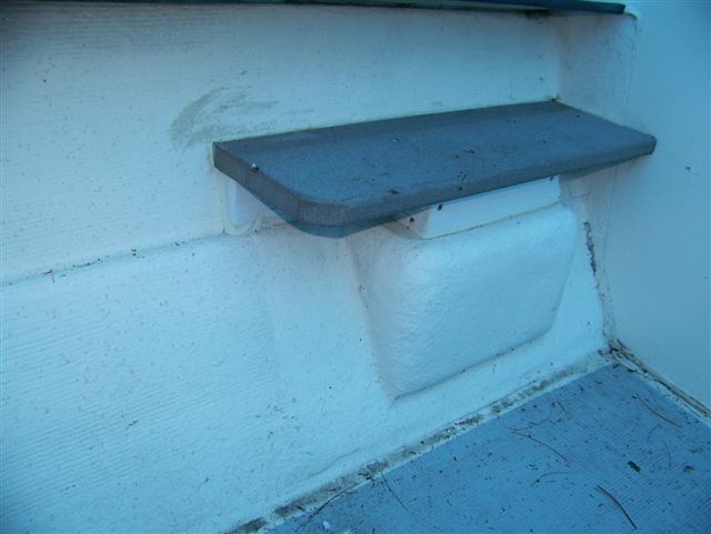 The tread is plastic decking board, the framing is pvc bricktrim. It is ss screwed together and to the original step along with liberal 4200.