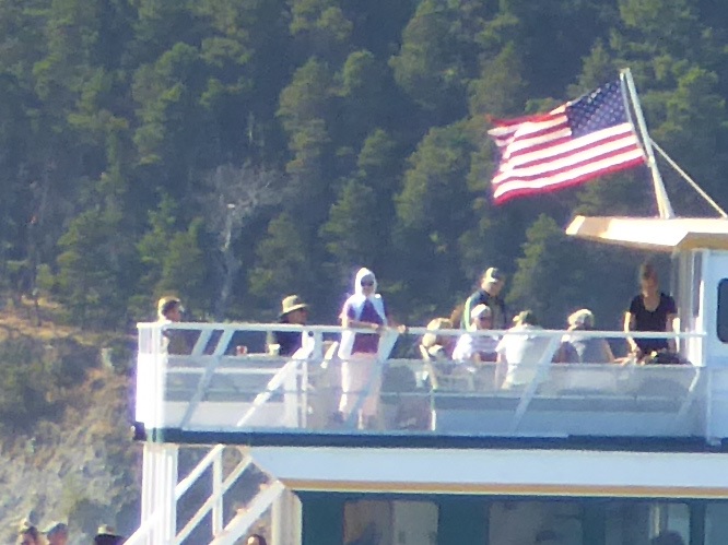 There they are- my mom in the white hoodie and uncle in the ball cap heading in towards the cabin.