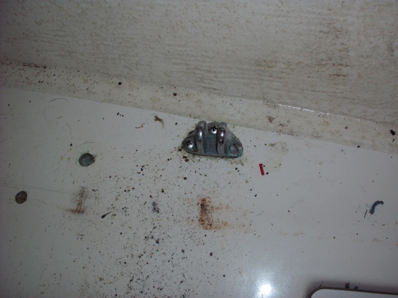 This gets through bolted into floor to keep chair from coming up in heavy seas