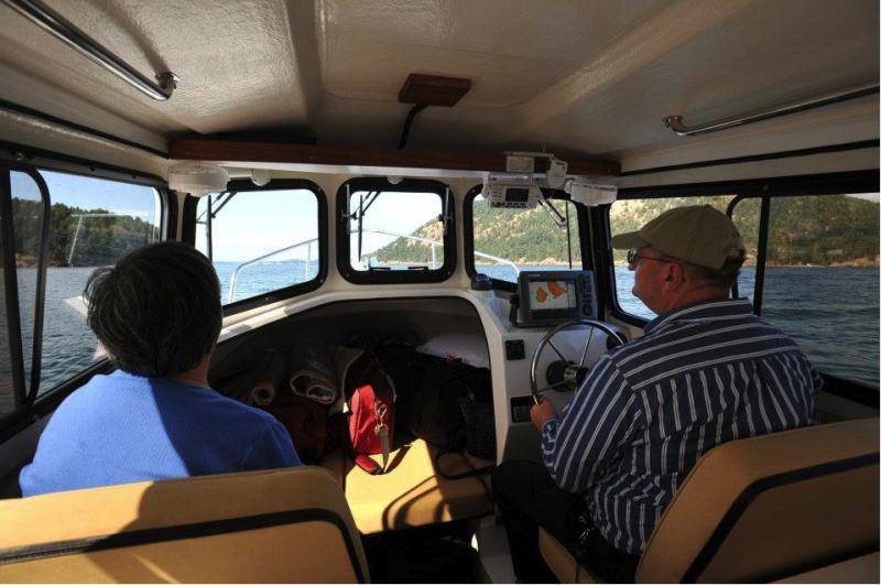 This great photo taken by Les Lampman on our maiden voyage shows the ample space in the cabin of this boat.  Moving up to the Marinaut 215 from our CD 16 Cruiser made a HUGE difference for us in comfort and elbow room.  9/26/12 update -- One thing important that can go overlooked is that the cabin walls go straight up, instead of angling in toward the center.  This visually creates a lot of space, and makes us feel we are in a much larger boat.  Indeed, over the course of a year, we spent over 30 nights on the Betty Ann, and we continue to feel we are in a very comfortable and unconfining living space.
