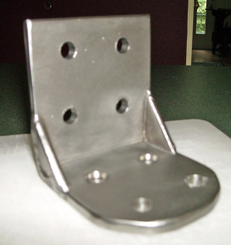 This is a stainless steel bracket I had made for the Garhauer Lifting Davit.  I want to mount the davit in the motorwell of my 22' Cruiser so the davit is directly over the kicker motor.  Problem is gas tank is directly under where I need to mount the foot.  This bracket is designed to mount on the starboard wall of the motor well area, to hold the foot.