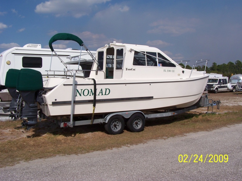 This is our 5th big boat.  We looked for over 4 years for this boat.  This is her sitting in the storage yard.  We wanted a trailerable, smaller, more economical, more livable boat.  And this was it for us.