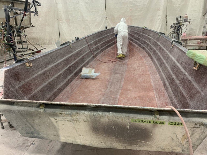 This is the 23 hull after all of the fiberglass has been ground down so that gel coat can be applied and small parts can be assembled.