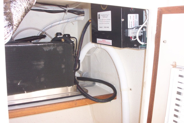 This is the actual A/C unit which fit very easily into the cabinet underneath the sink.