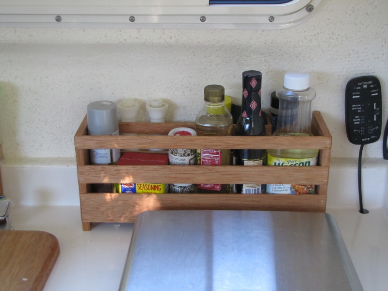 This one behind stove to hold cooking supplies.