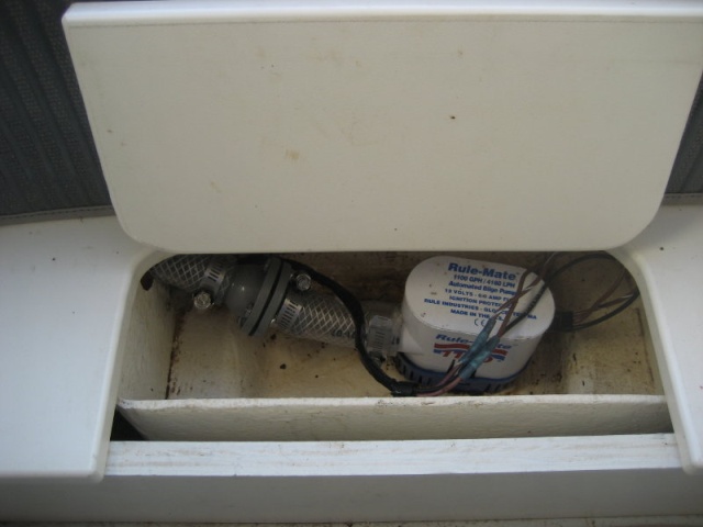 This photo shows the center bilge sump that came after the starboard side one, but before the "permanent" raised cockpit sole. I believe this is from "C-batical."