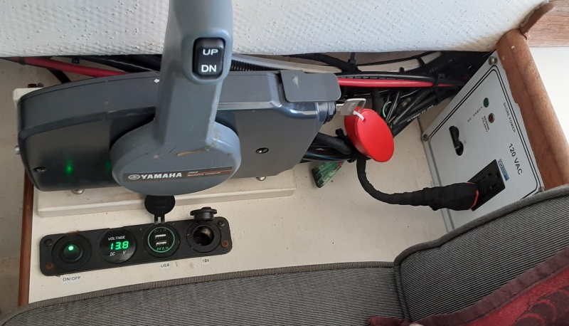 Throttle, DC plugs, and AC/DC main switch panel located next to captains station
