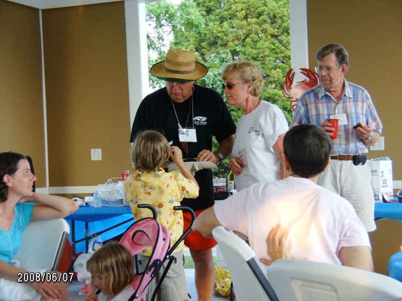 Tom,Anne and Riley drawing names for prizes.