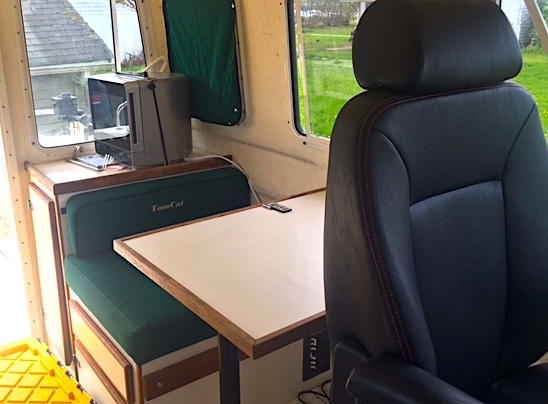 Tomcat Table with Reclining Passenger Seat that can swivel 180 Degrees to face the rear.